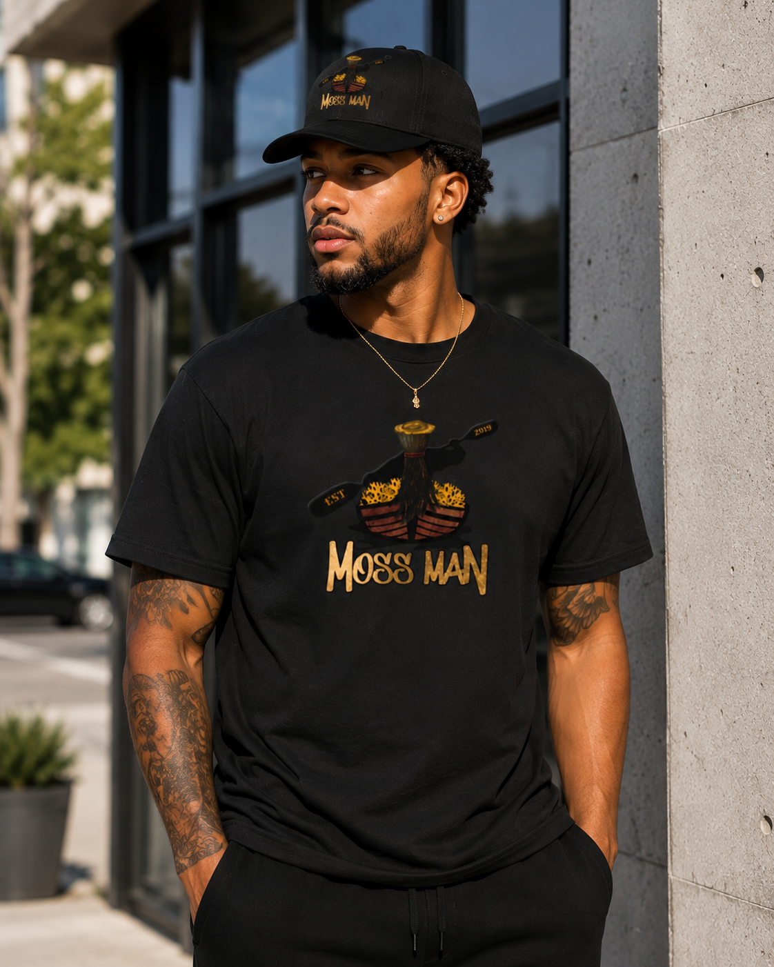 Male model wearing Moss Man Logo Tee
